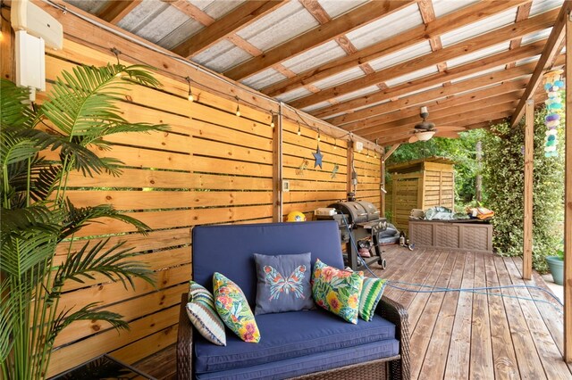 40 Jada Ln, Brunswick, GA 31523 - deck with ceiling fan, grilling area, and an outdoor hangout area