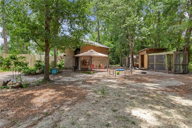40 Jada Ln, Brunswick, GA 31523 - view of yard featuring exterior structure, an outbuilding, and a gazebo