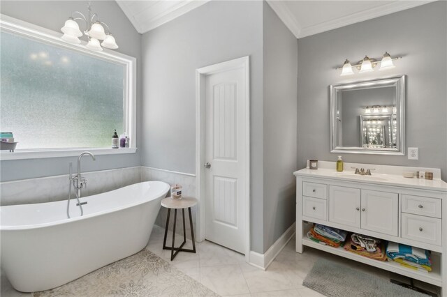 40 Jada Ln, Brunswick, GA 31523 - bathroom featuring vanity, a freestanding bath, a chandelier, and ornamental molding