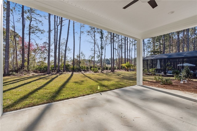 exterior space with a ceiling fan