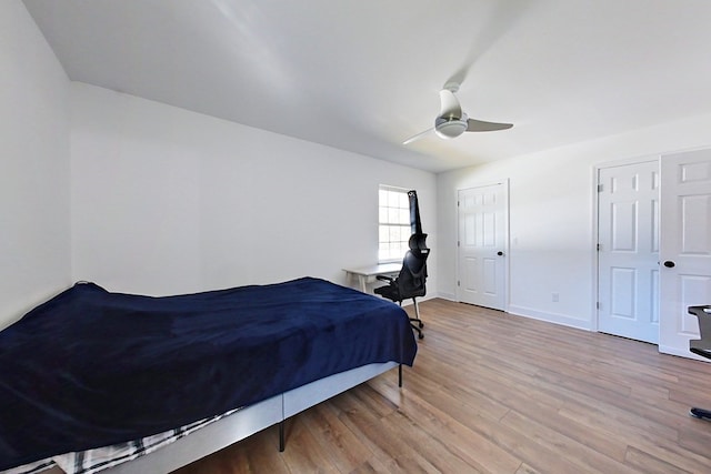 1625 Windsor Dr, Waycross, GA 31501 - bedroom with light wood-style floors, baseboards, and ceiling fan
