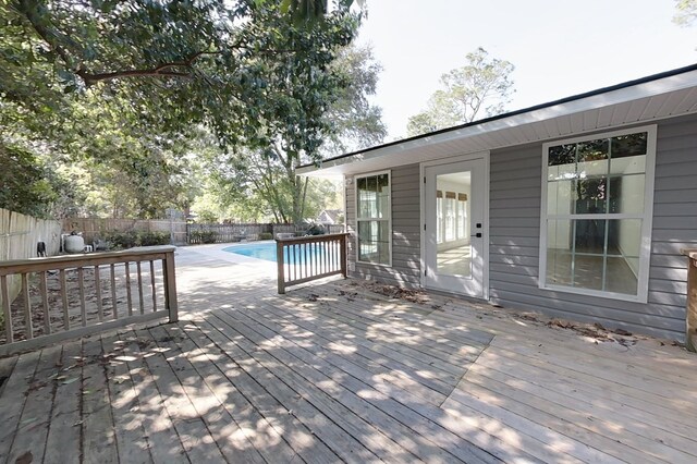 1625 Windsor Dr, Waycross, GA 31501 - deck featuring fence and a fenced in pool