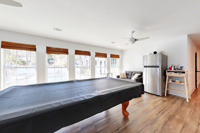 1625 Windsor Dr, Waycross, GA 31501 - playroom with light wood-type flooring, visible vents, pool table, and ceiling fan