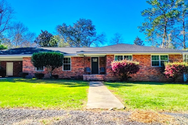 1625 Windsor Dr, Waycross, GA 31501 - ranch-style home with brick siding, crawl space, a front yard, and a carport