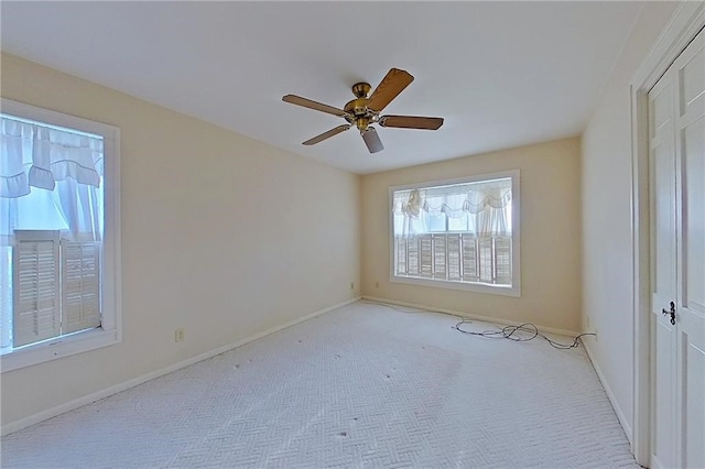 2227 Ware St, Blackshear, GA 31516 - carpeted empty room featuring a ceiling fan and baseboards