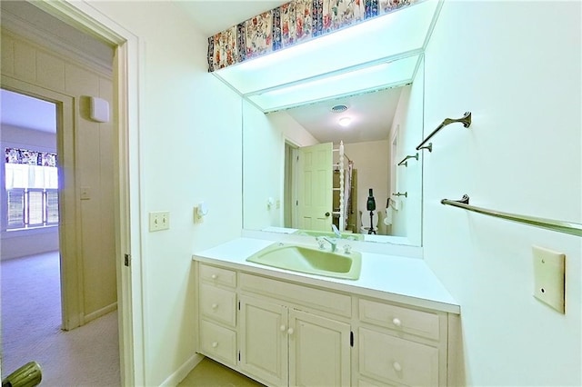 2227 Ware St, Blackshear, GA 31516 - bathroom featuring vanity and baseboards