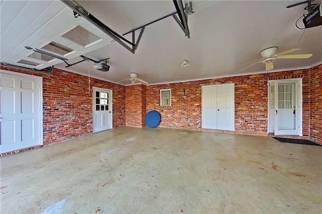 2227 Ware St, Blackshear, GA 31516 - garage with a garage door opener and a ceiling fan