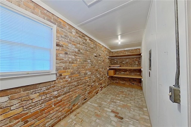 2227 Ware St, Blackshear, GA 31516 - corridor with brick wall and brick flooring