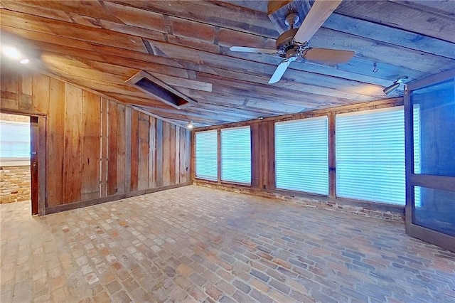 2227 Ware St, Blackshear, GA 31516 - misc room with ceiling fan, plenty of natural light, wooden walls, wood ceiling, and lofted ceiling