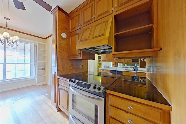 2227 Ware St, Blackshear, GA 31516 - kitchen with stainless steel range with electric cooktop, light wood-style floors, custom range hood, a chandelier, and brown cabinets