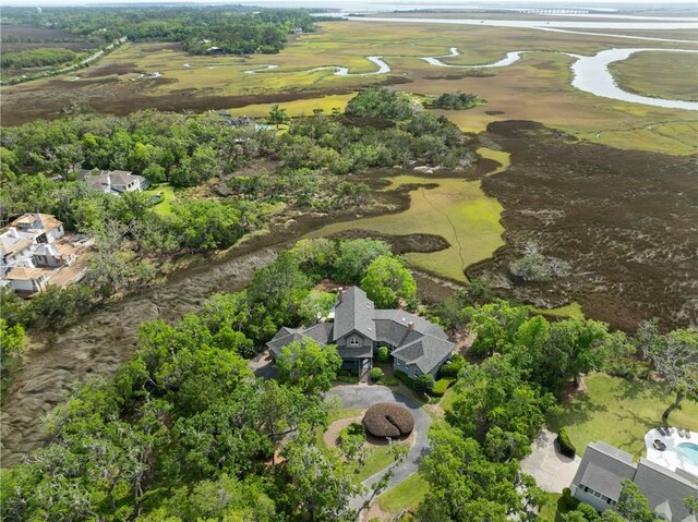 aerial view with view of golf course and a water view