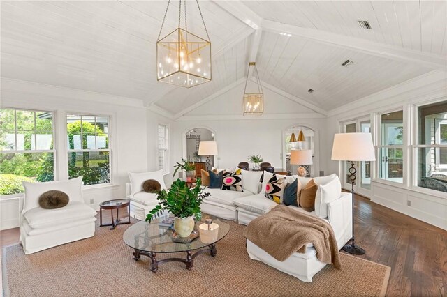 sunroom / solarium with arched walkways, a notable chandelier, visible vents, and beamed ceiling