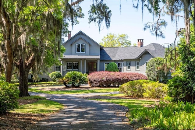 view of front of home with a chimney