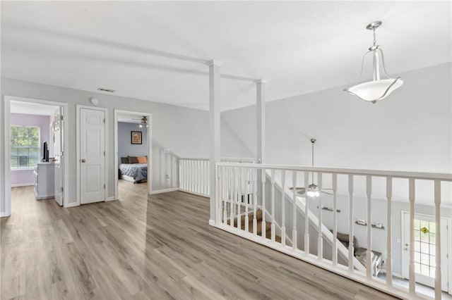 107 Tori Dr, Saint Marys, GA 31558 - empty room with a ceiling fan, light wood finished floors, and baseboards