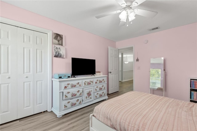 107 Tori Dr, Saint Marys, GA 31558 - bedroom with light wood finished floors, a closet, and a ceiling fan