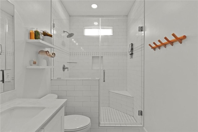 502 Ridge Rd, Darien, GA 31305 - bathroom featuring toilet, a shower stall, and vanity