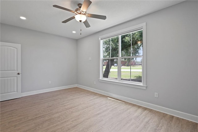 502 Ridge Rd, Darien, GA 31305 - spare room featuring wood finished floors, baseboards, ceiling fan, and recessed lighting