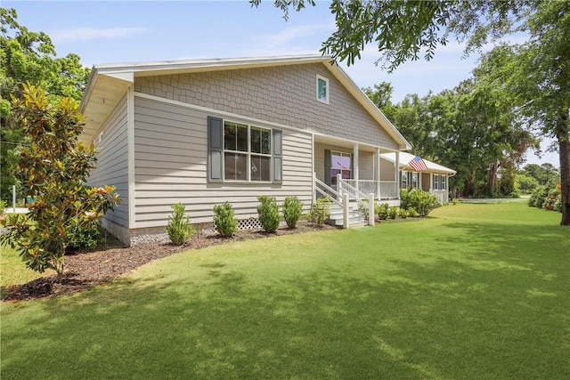 502 Ridge Rd, Darien, GA 31305 - view of front facade featuring a porch and a front yard