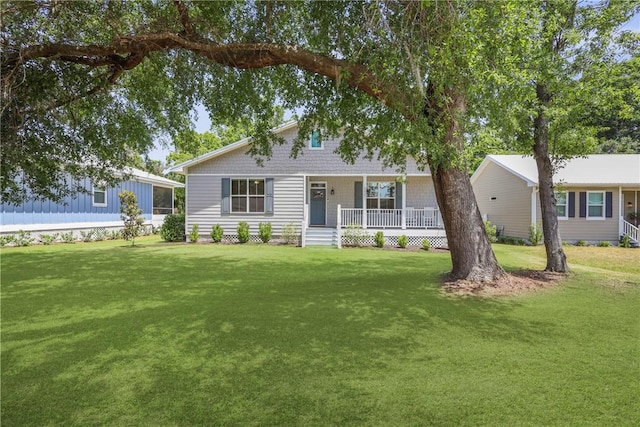 502 Ridge Rd, Darien, GA 31305 - view of front of house with covered porch and a front yard