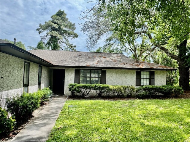 126 Lake View Cir, Brunswick, GA 31525 - single story home featuring stucco siding and a front lawn