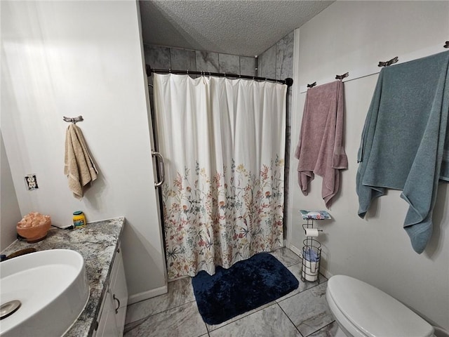 300 Crestview Dr, Woodbine, GA 31569 - bathroom featuring a textured ceiling, marble look tiles, vanity, curtained shower, and toilet