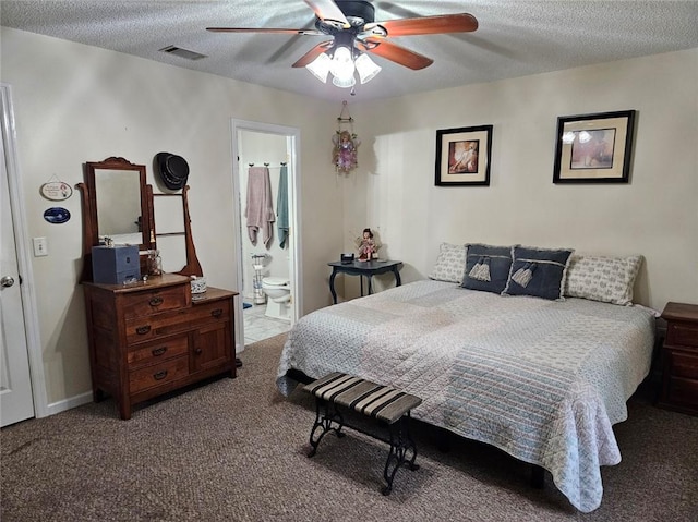 300 Crestview Dr, Woodbine, GA 31569 - carpeted bedroom with a textured ceiling, ensuite bath, and a ceiling fan