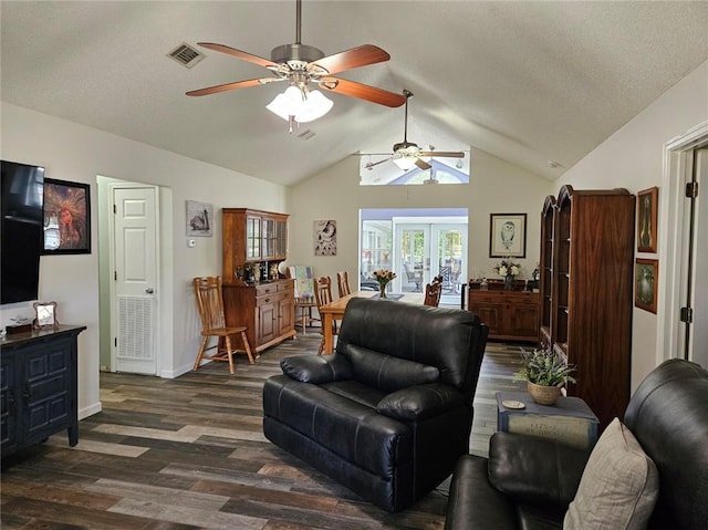 300 Crestview Dr, Woodbine, GA 31569 - living area with a ceiling fan, vaulted ceiling, dark wood-style flooring, and baseboards