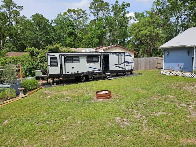 300 Crestview Dr, Woodbine, GA 31569 - view of yard featuring a fire pit and a vegetable garden