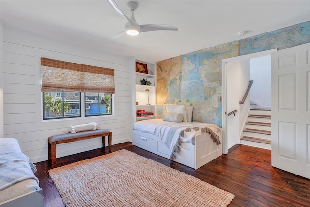 bedroom featuring dark wood-type flooring and ceiling fan