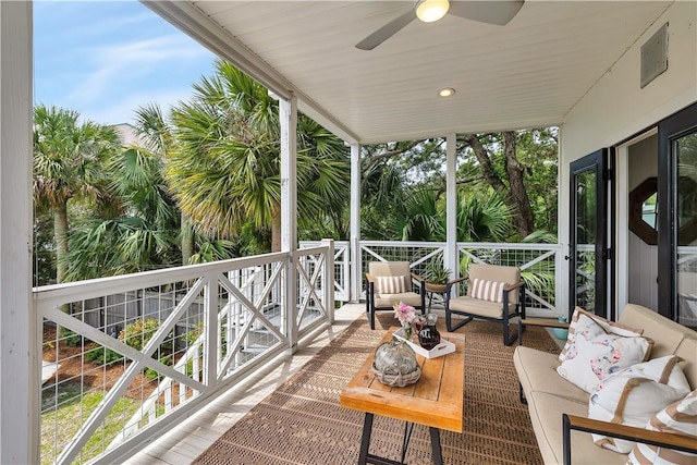 exterior space with outdoor lounge area and a ceiling fan