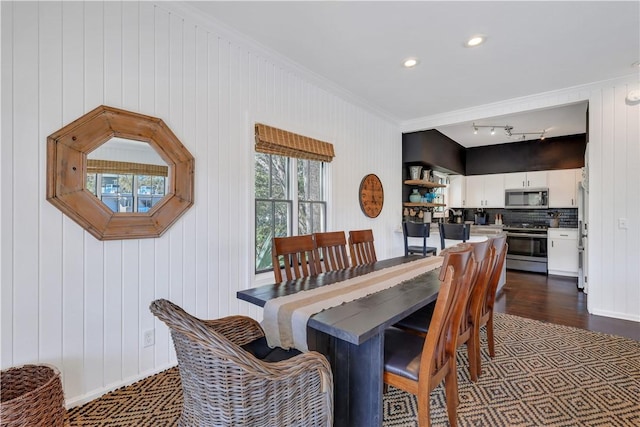 dining room featuring ornamental molding, recessed lighting, and track lighting