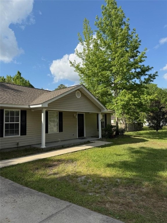 155 May Rd, Brunswick, GA 31525 - view of front of house with a front yard