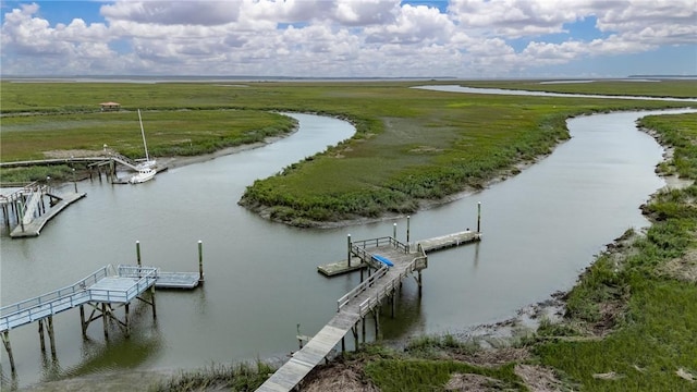 drone / aerial view with a rural view and a water view