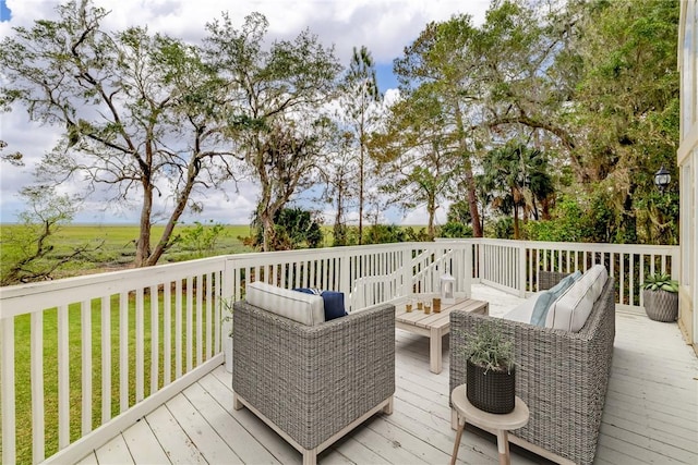 wooden terrace featuring an outdoor living space