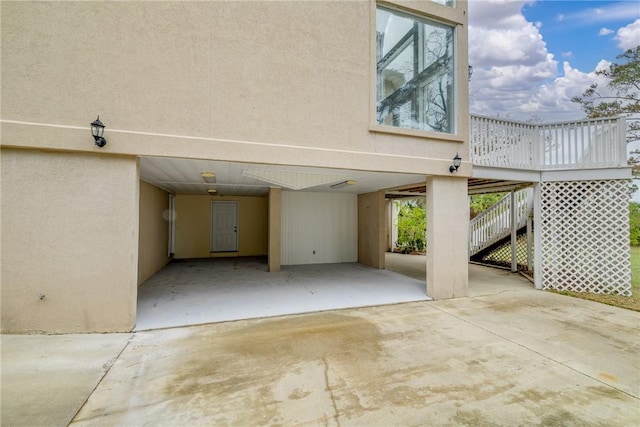 exterior space featuring a carport