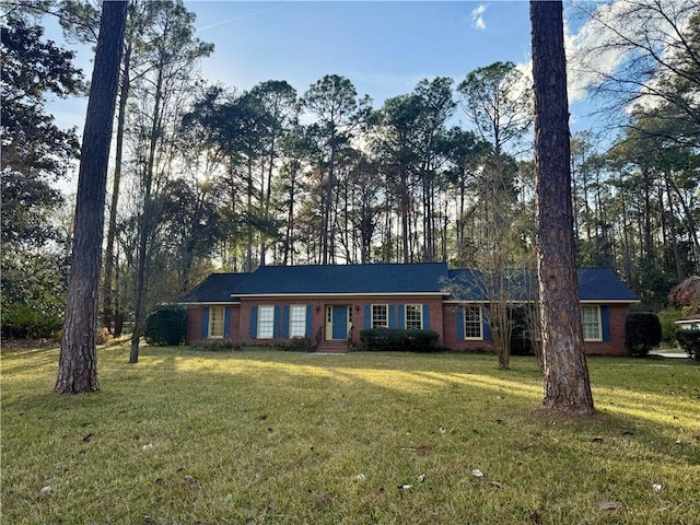 ranch-style house with a front yard