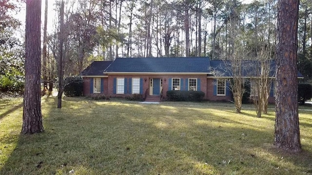 ranch-style house with a front lawn