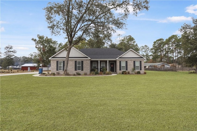 view of front of home featuring a front yard