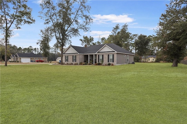 single story home with a front lawn