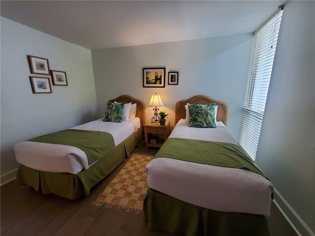 bedroom featuring wood-type flooring