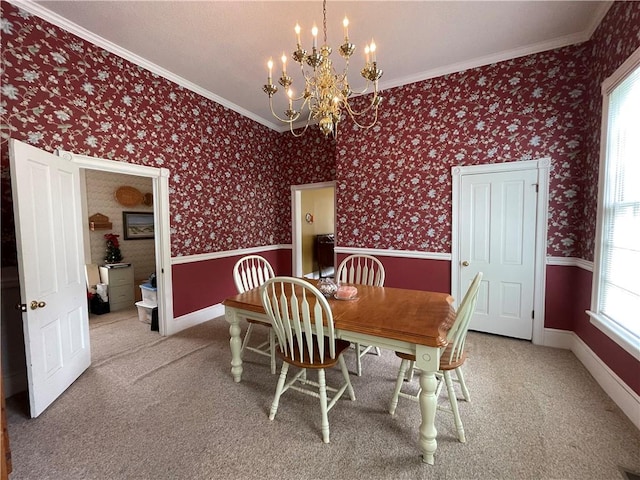 725 Grant St, Brunswick, GA 31520 - carpeted dining area with a notable chandelier, crown molding, and wallpapered walls