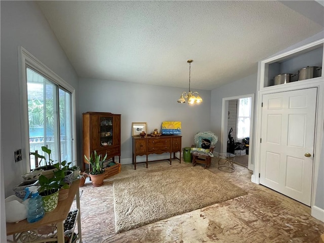 725 Grant St, Brunswick, GA 31520 - interior space with lofted ceiling, plenty of natural light, and a textured ceiling
