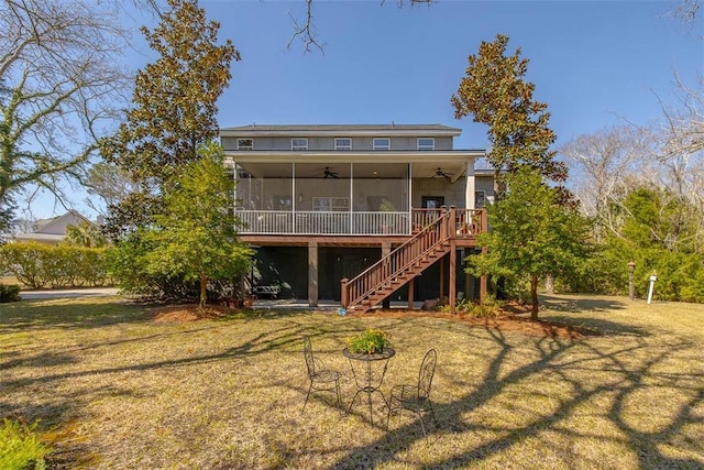 113 Cabretta Island Cir, Brunswick, GA 31520 - rear view of property with a lawn, ceiling fan, stairs, and a sunroom