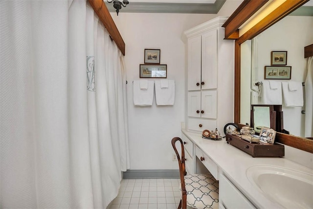 113 Cabretta Island Cir, Brunswick, GA 31520 - bathroom with baseboards, vanity, and tile patterned flooring