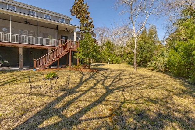 113 Cabretta Island Cir, Brunswick, GA 31520 - view of yard with stairway, a ceiling fan, and a sunroom