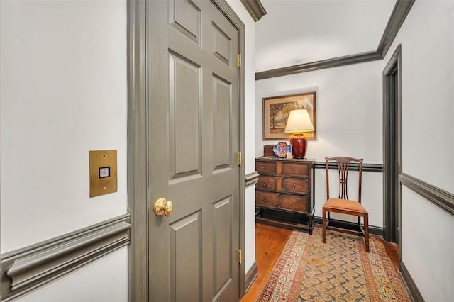 113 Cabretta Island Cir, Brunswick, GA 31520 - hallway with baseboards, wood finished floors, and crown molding