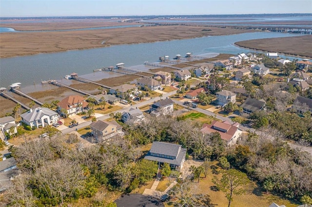 113 Cabretta Island Cir, Brunswick, GA 31520 - drone / aerial view featuring a residential view and a water view