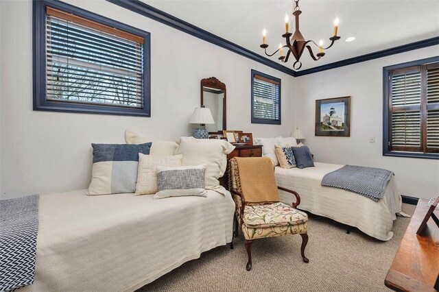 113 Cabretta Island Cir, Brunswick, GA 31520 - bedroom with crown molding and a chandelier