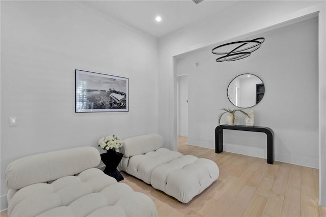 sitting room with light hardwood / wood-style flooring