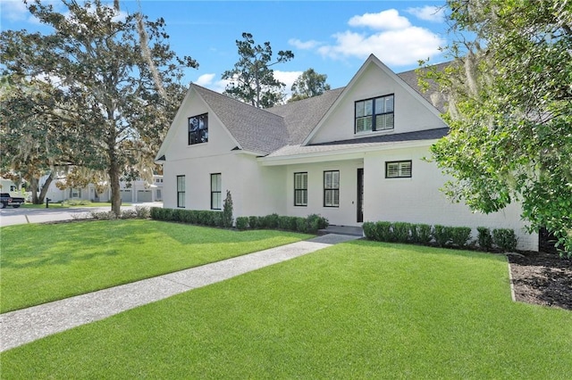 view of front of home featuring a front lawn